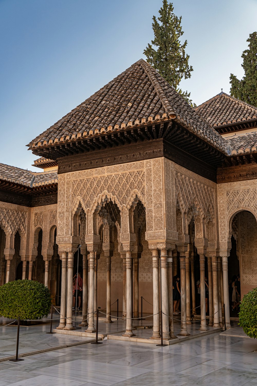 a large building with a lot of pillars and arches