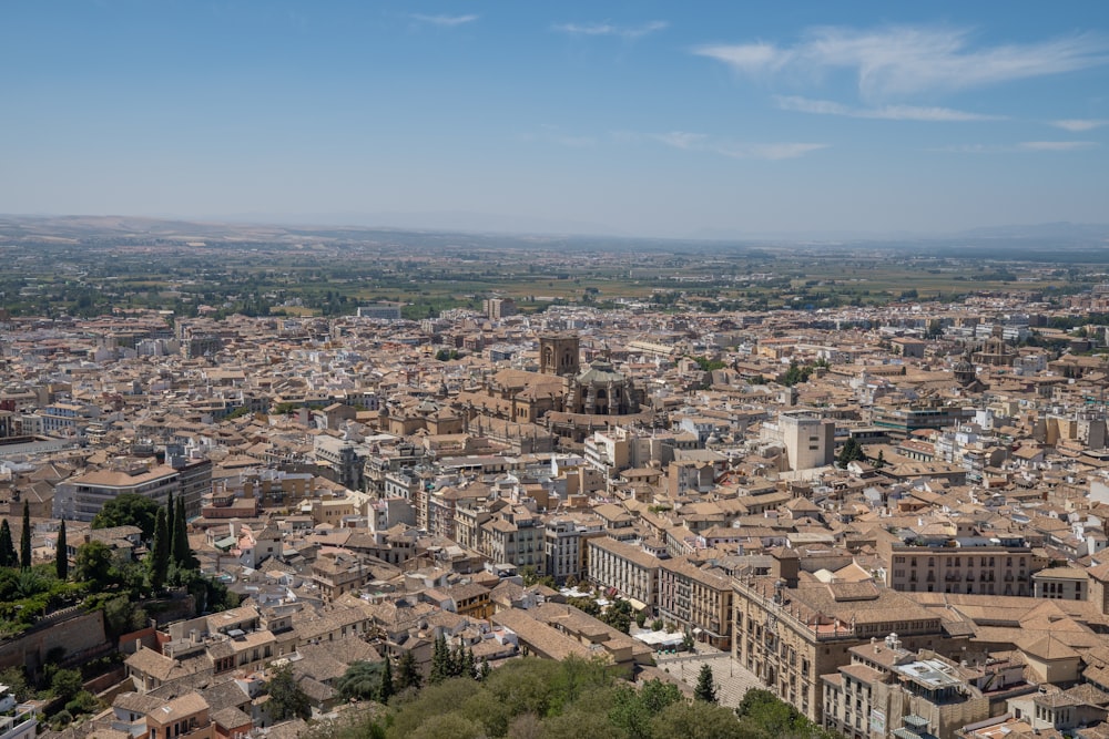 a view of a city from a hill