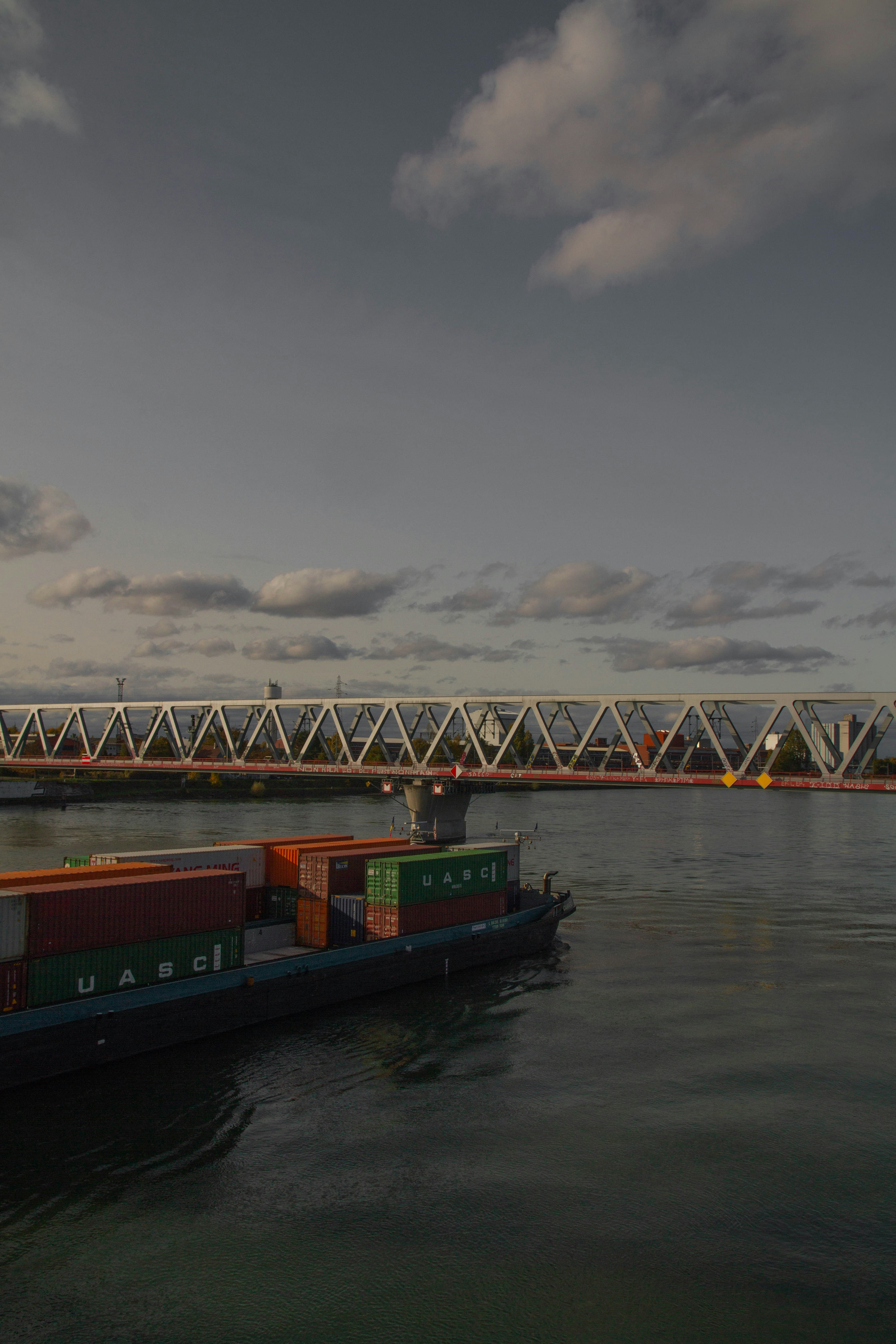 a large cargo ship floating on top of a body of water