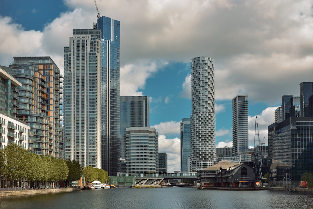 a body of water surrounded by tall buildings