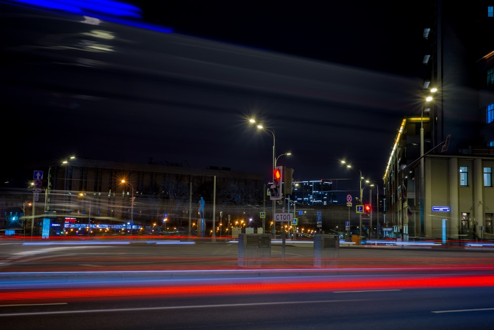 a blurry photo of a city street at night