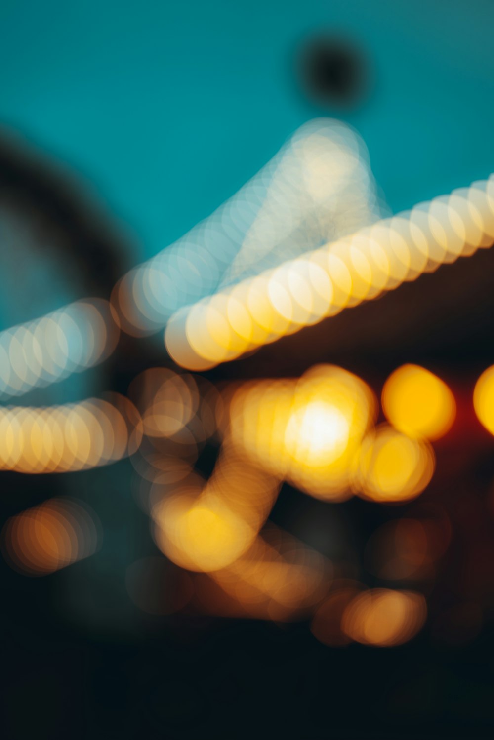 a blurry photo of a city street at night