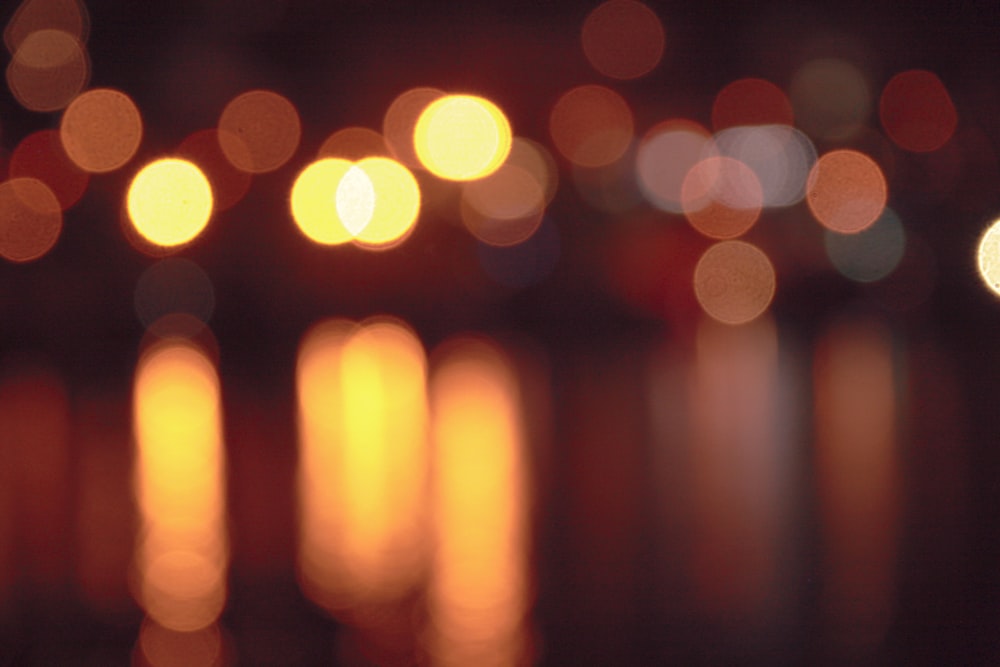 a blurry photo of a city street at night