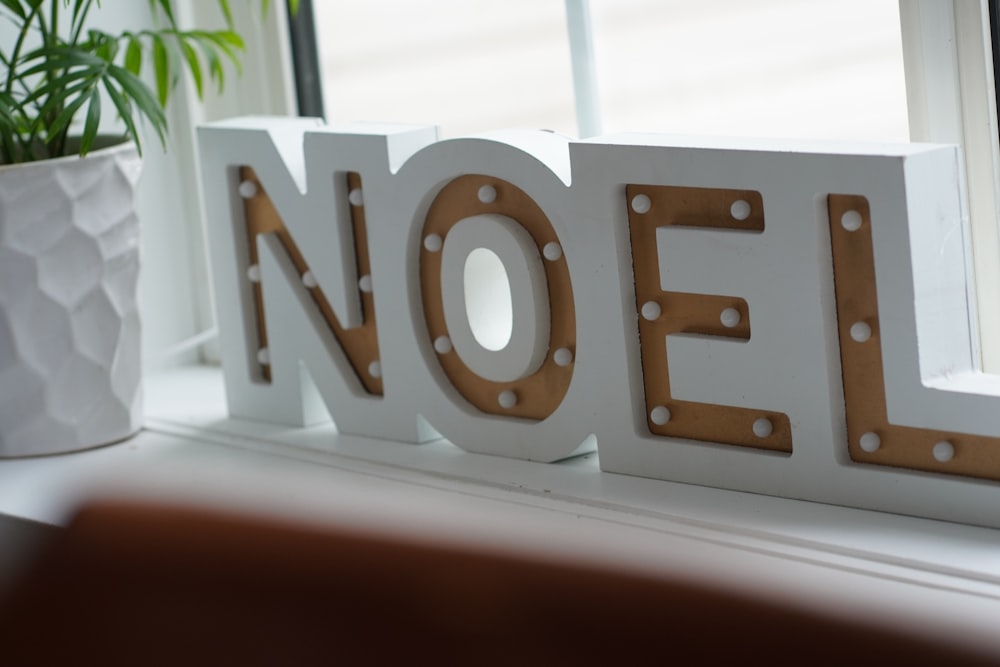 a close up of a sign on a window sill