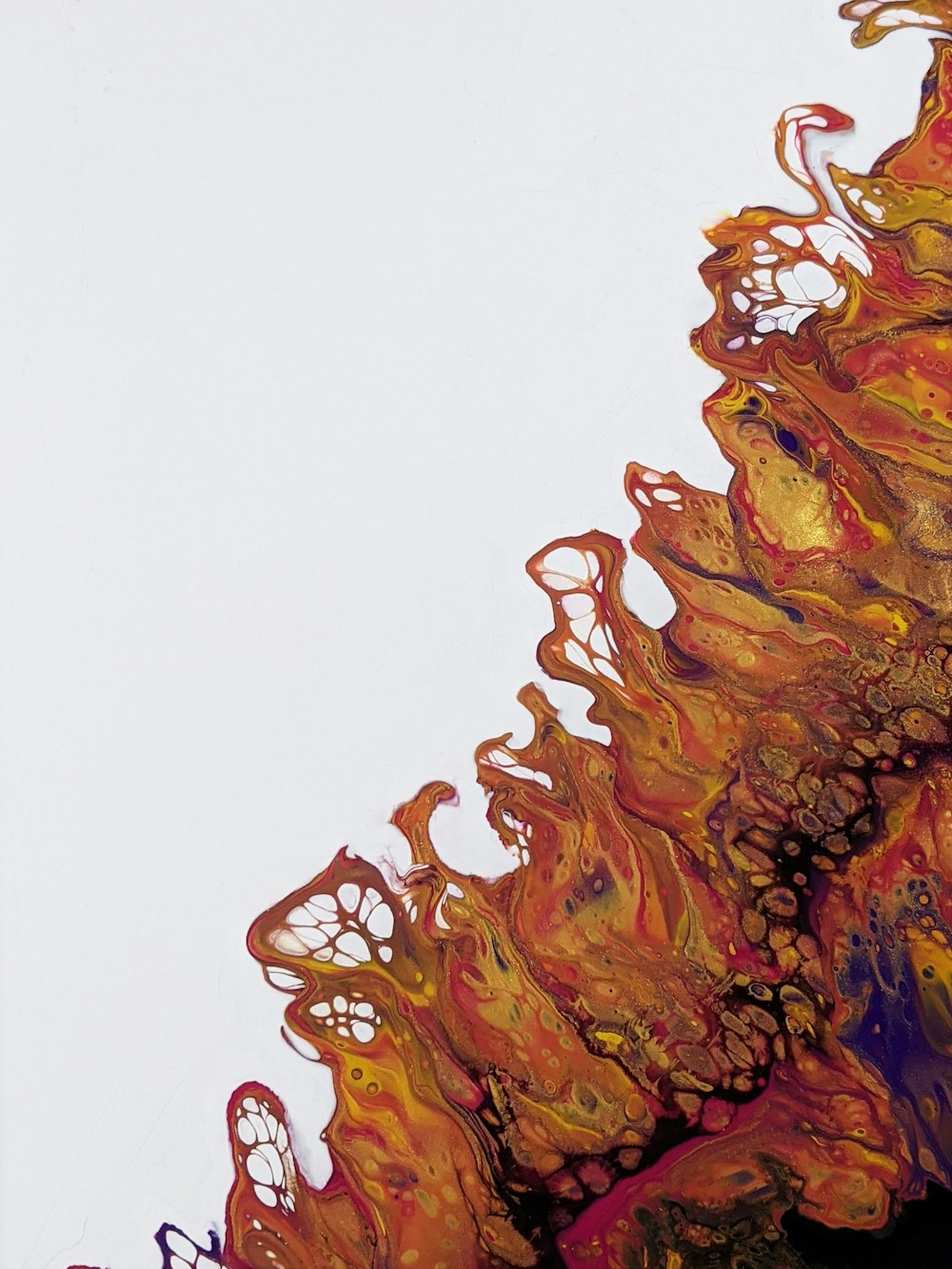 an abstract painting of orange and yellow colors