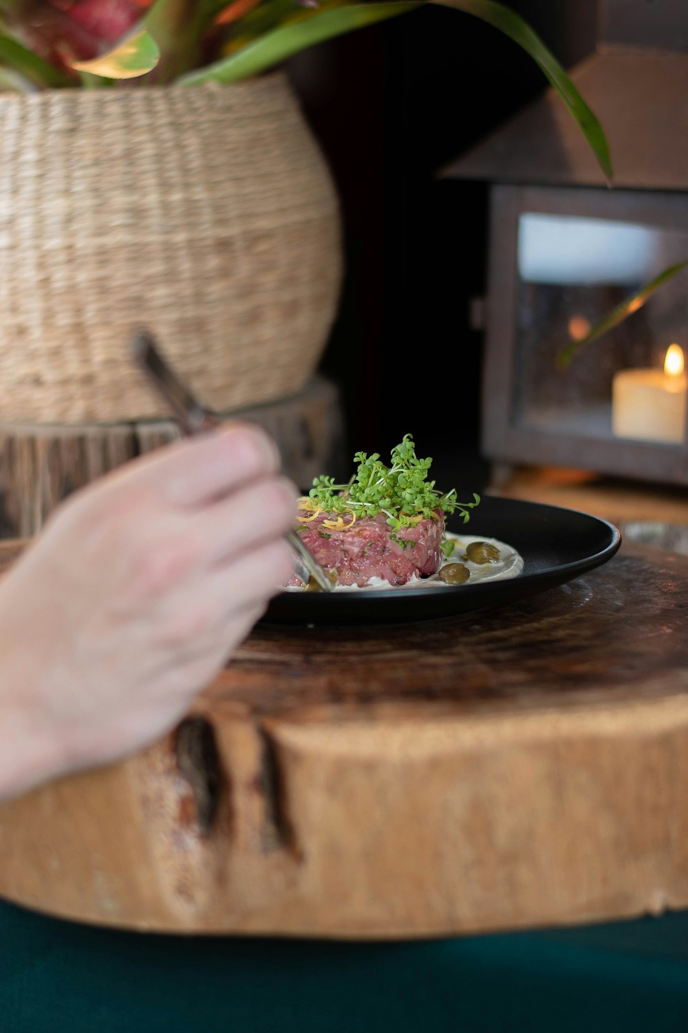 a plate of food on a wooden table