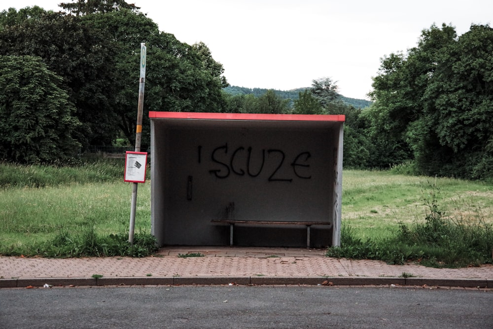 a bench sitting in the middle of a field