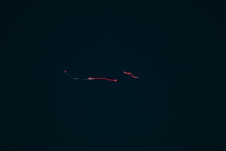 A minimalist dark-themed website homepage with smooth scrolling and subtle animations.