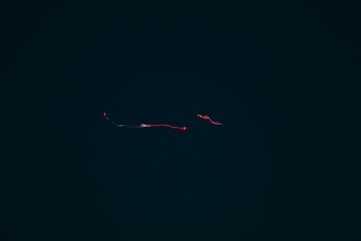 Minimalist dark gradient background with gentle animated pulses symbolizing connection.