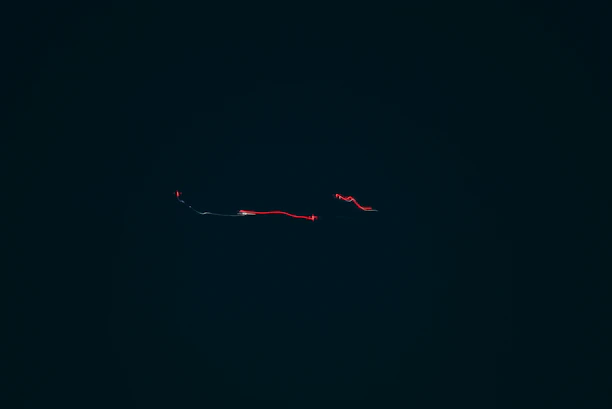 Animated background with subtle light effects and construction elements.