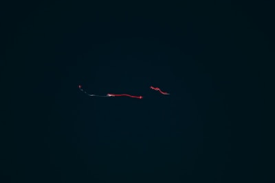 An interactive dark background with subtle glowing lines responding to cursor movement, embodying a responsive AI interface.