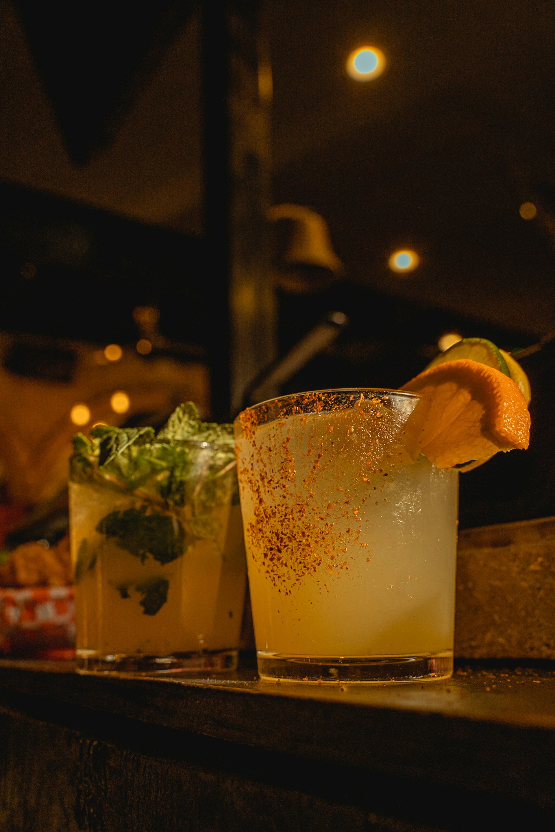 a close up of a drink on a bar