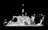Dynamic, splashing liquid with droplets suspended mid-air, against a dark background.