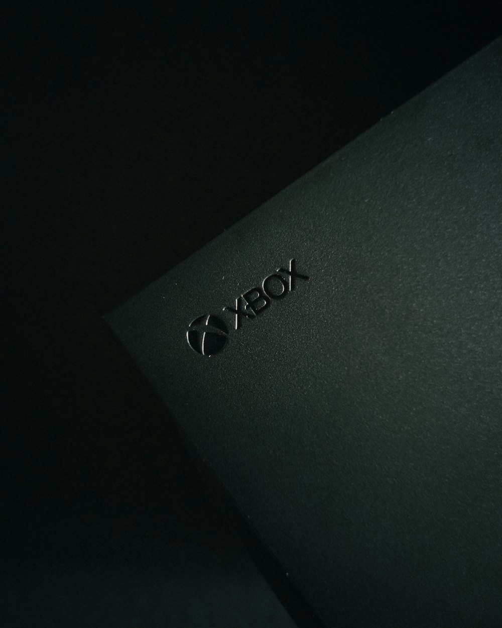 a close up of a laptop in the dark