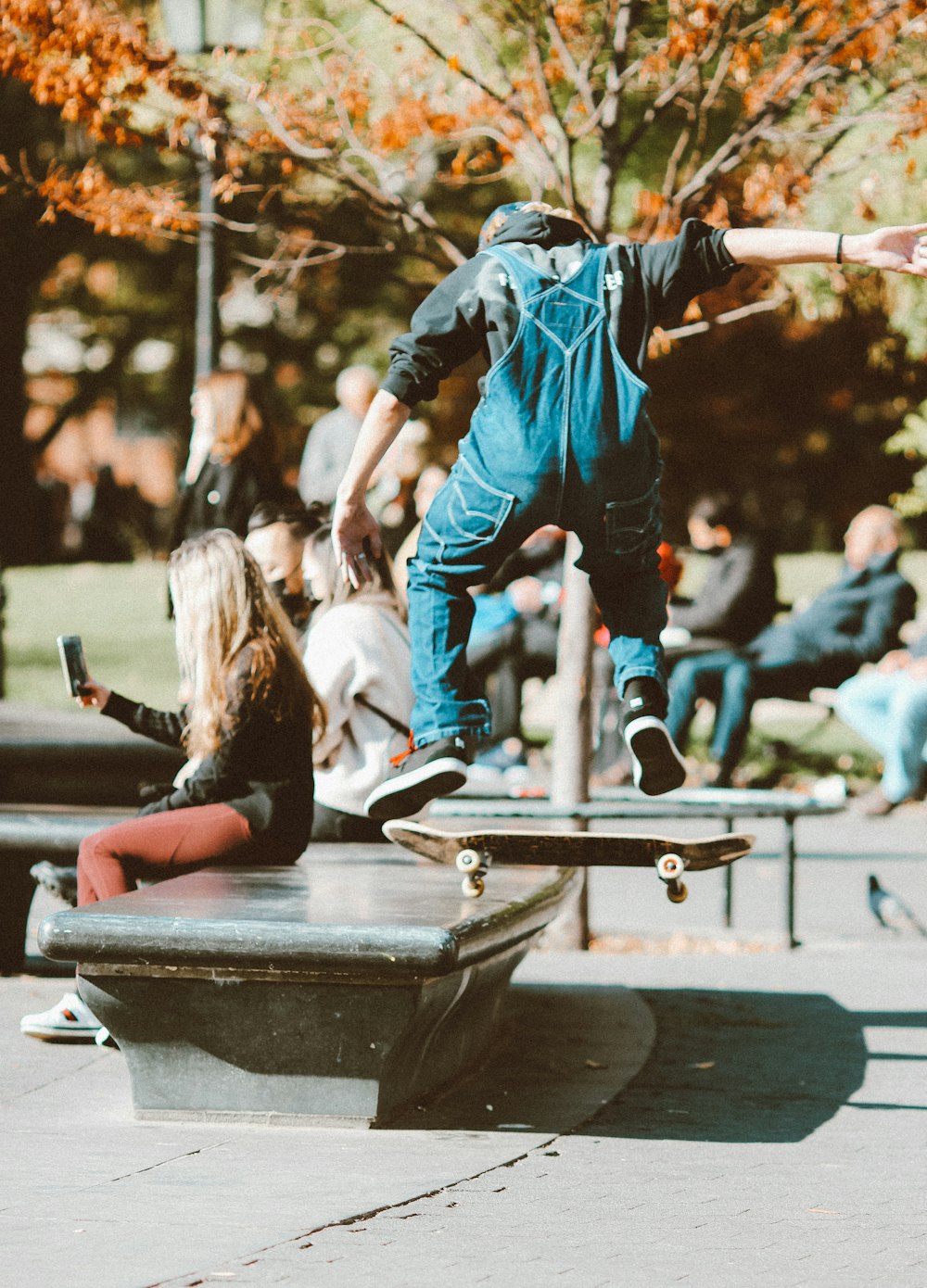 a person jumping a skate board in the air