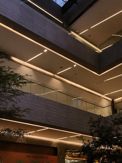 Close-up of sleek LED strip lighting installed in a modern architectural space highlighting clean lines and warm illumination.