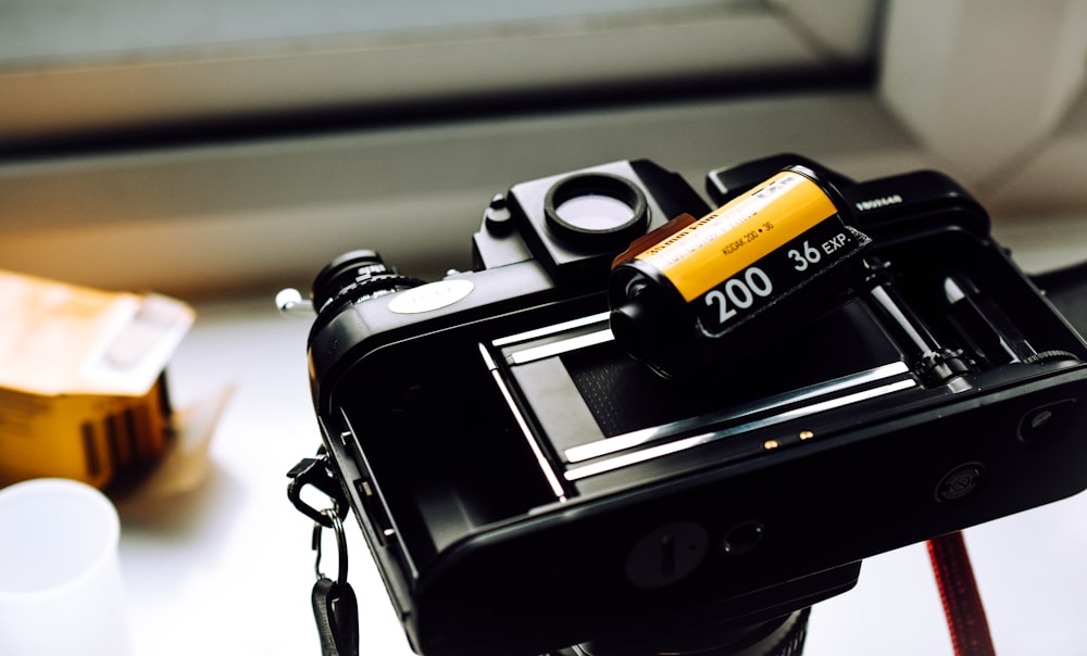 a camera with a battery attached to it