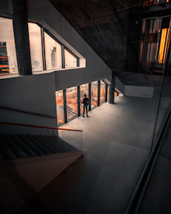 Professional real estate agent inspecting a modern apartment interior.