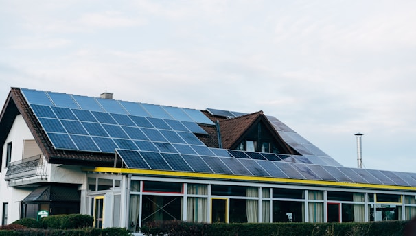 a house with solar panels on the roof