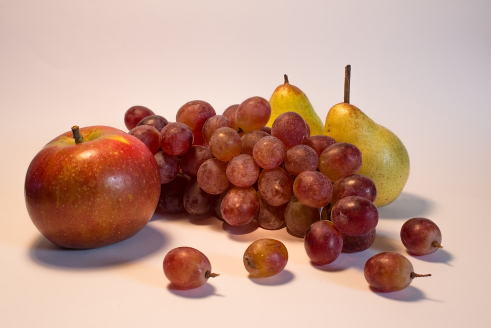 a bunch of fruit sitting on top of a table