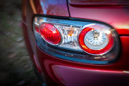 Custom-designed stoplamp with red and clear sections installed on a modern car