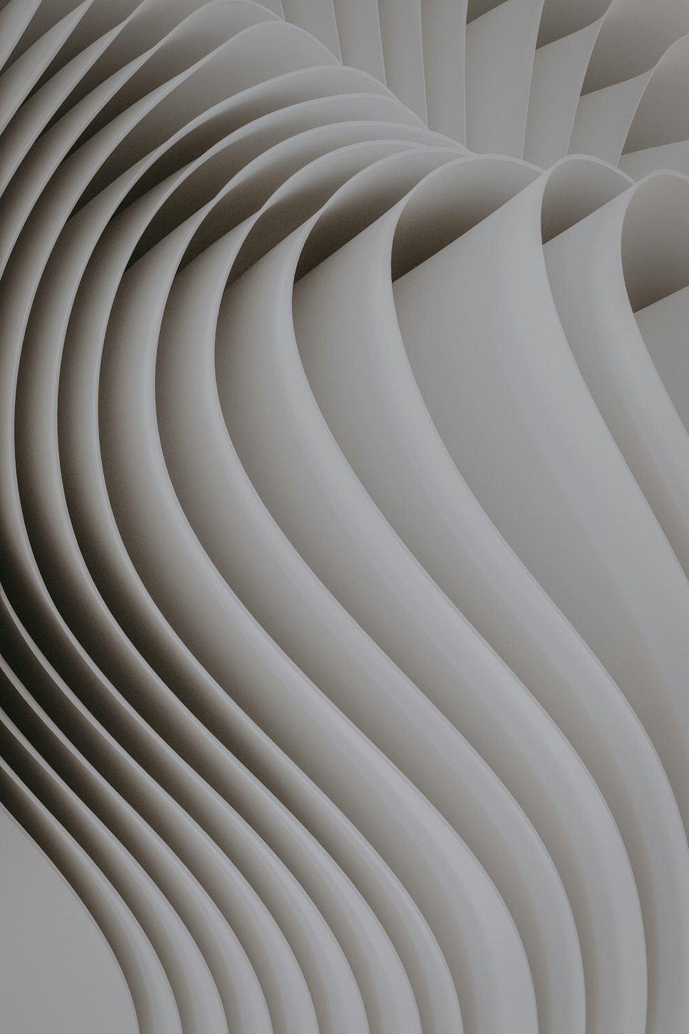 an abstract image of wavy lines on a white background