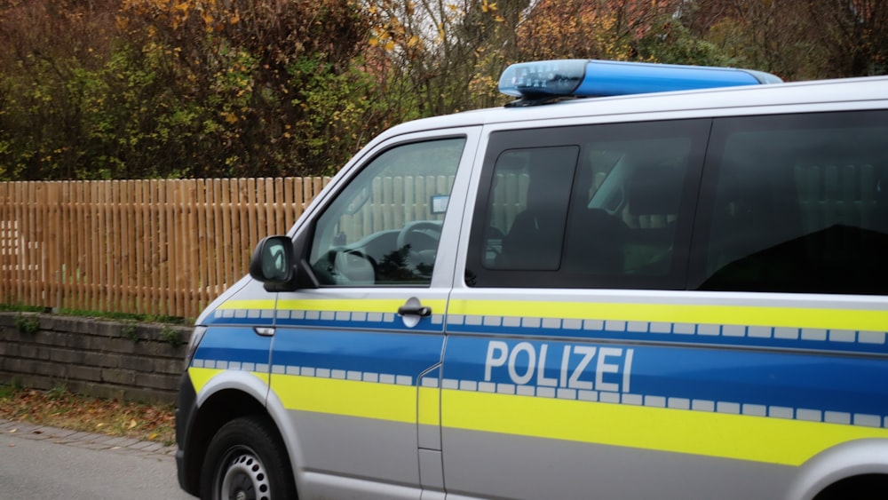 a police car parked on the side of the road