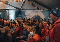 Attentive audience during a France-Mongolia cultural conference in a cozy venue.