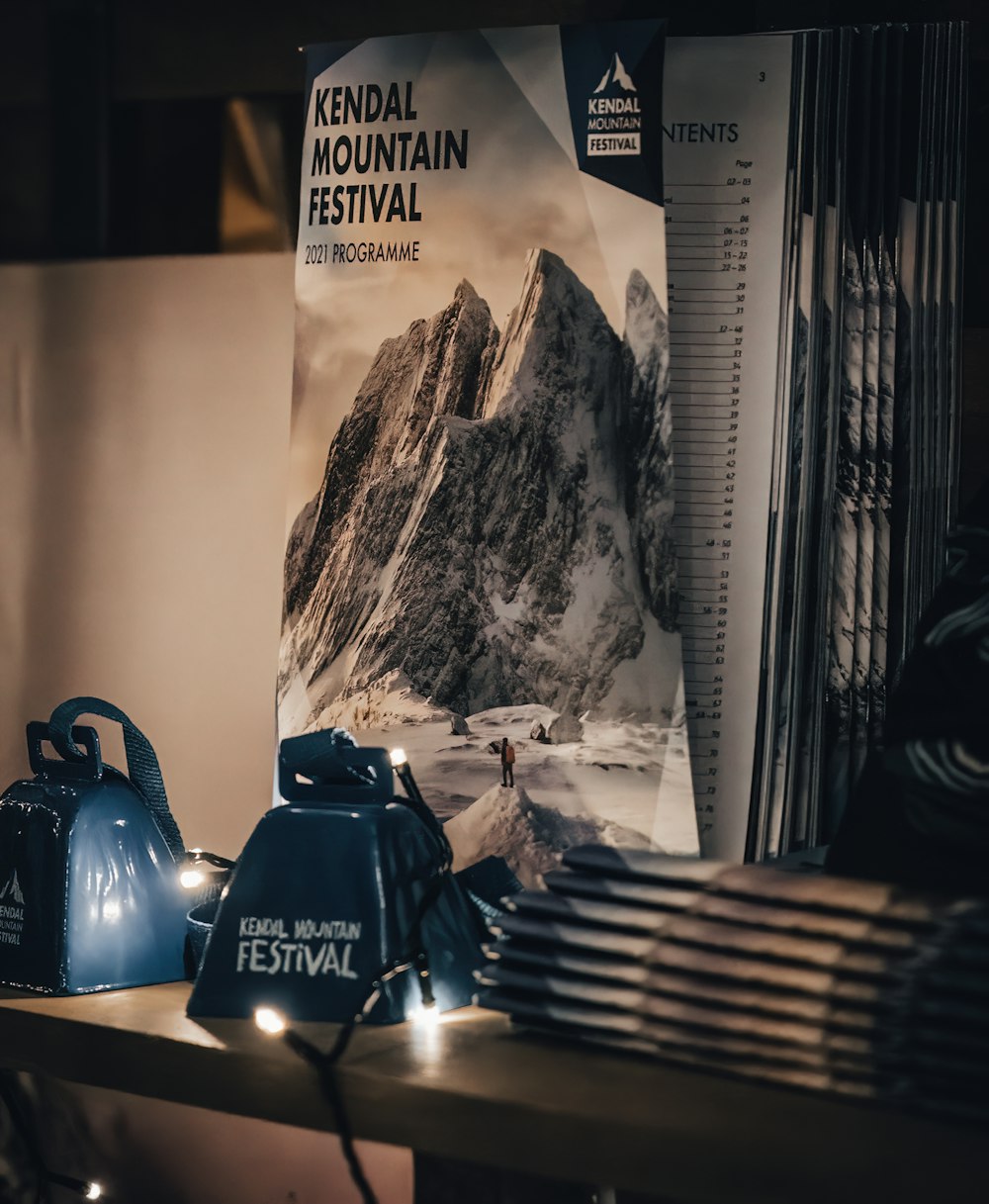 a book with a picture of a mountain in the background