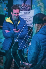 A customer discussing cell phone plan options with a friendly Wireless Montana representative.