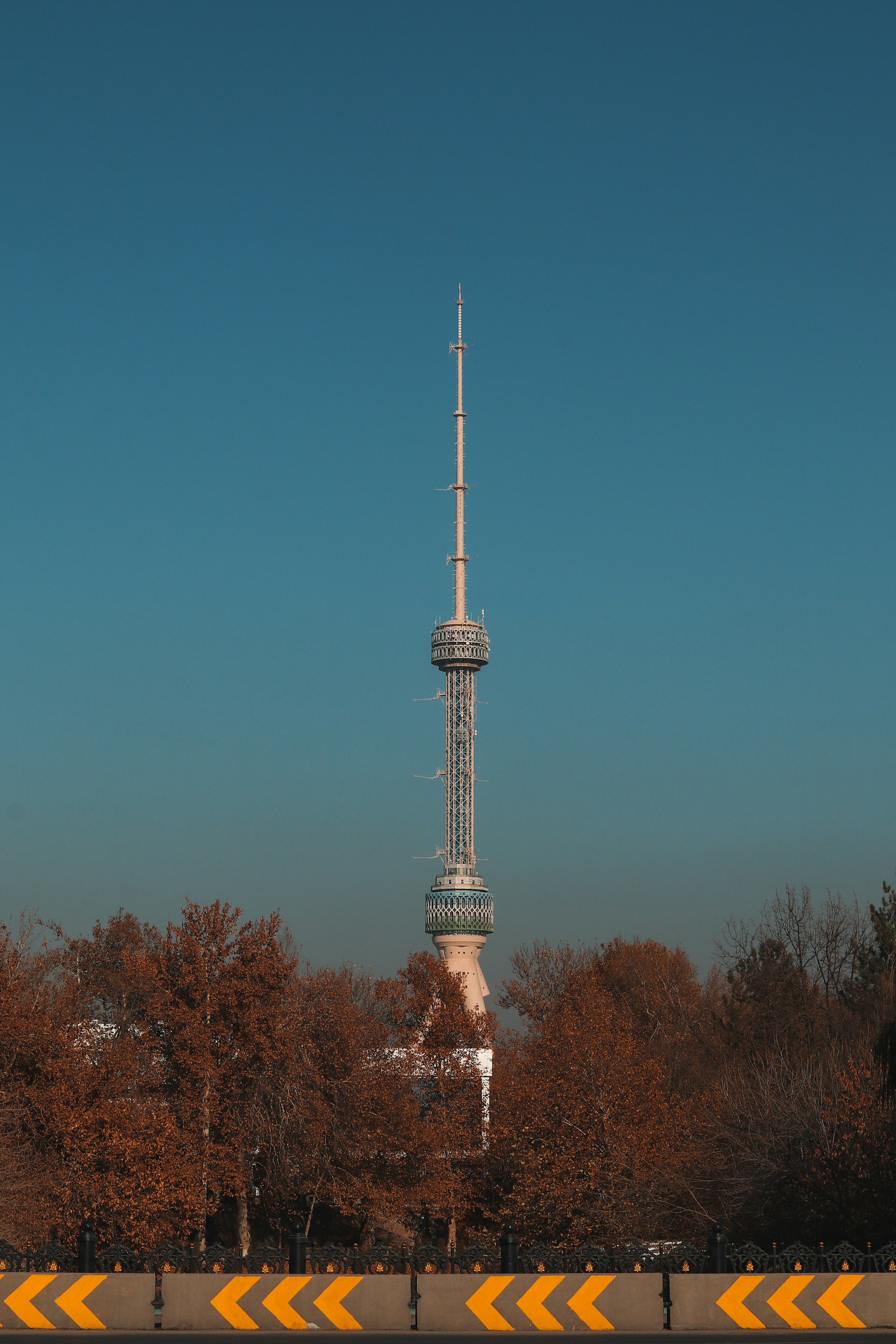 a tall tower with a clock on the top of it