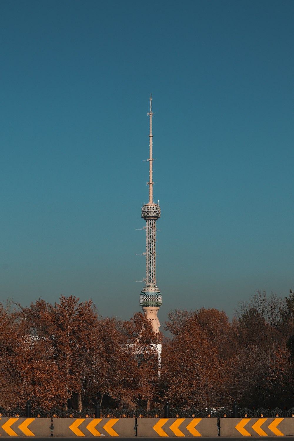 a tall tower with a clock on the top of it