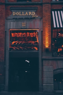 Exterior view of the Marcia Araujo Gomes meat shop with inviting signage.