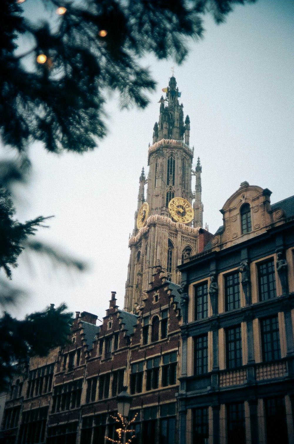 a tall building with a clock on it's side