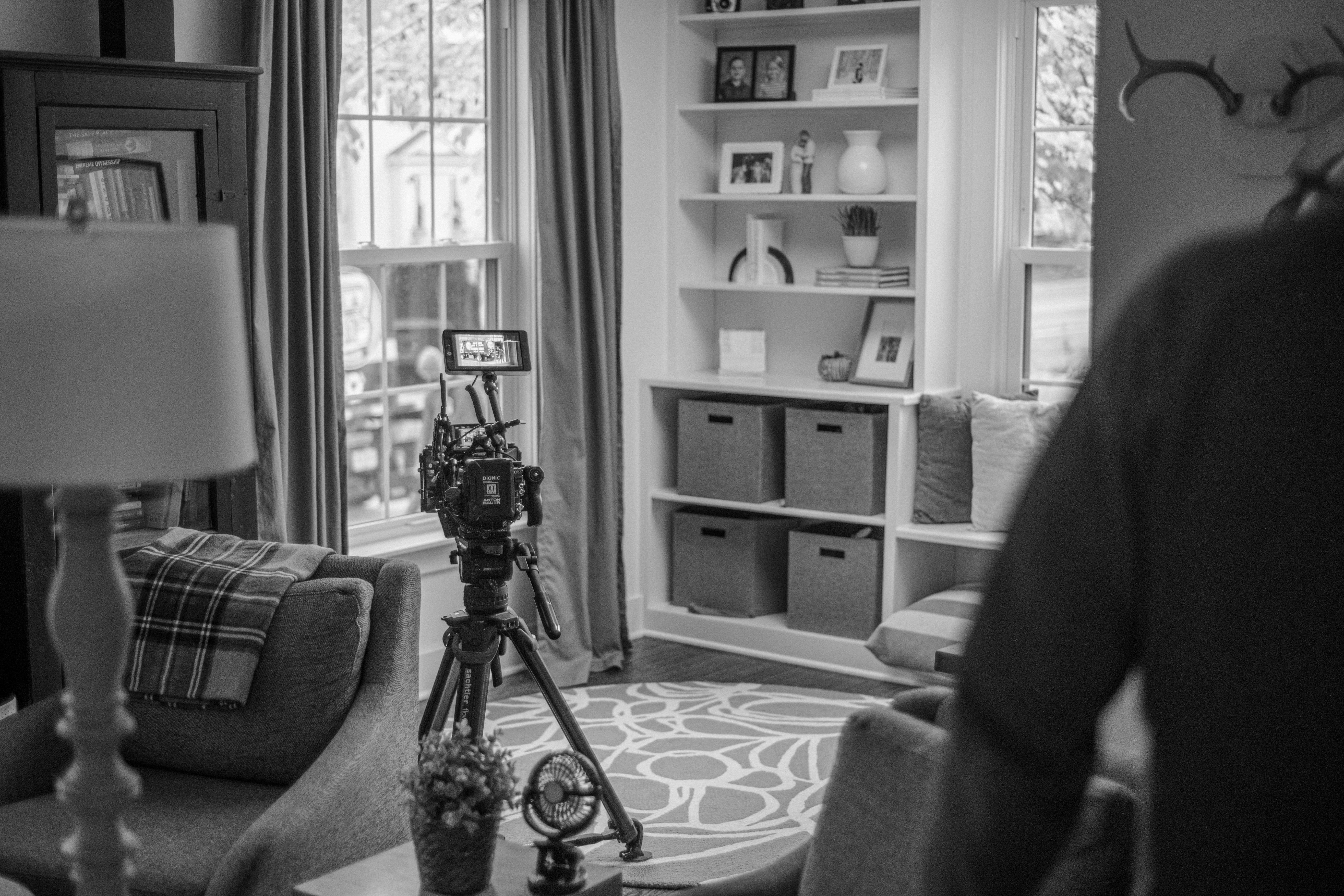 a black and white photo of a living room