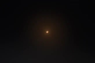 A single glowing node surrounded by empty space, evoking mystery and potential.