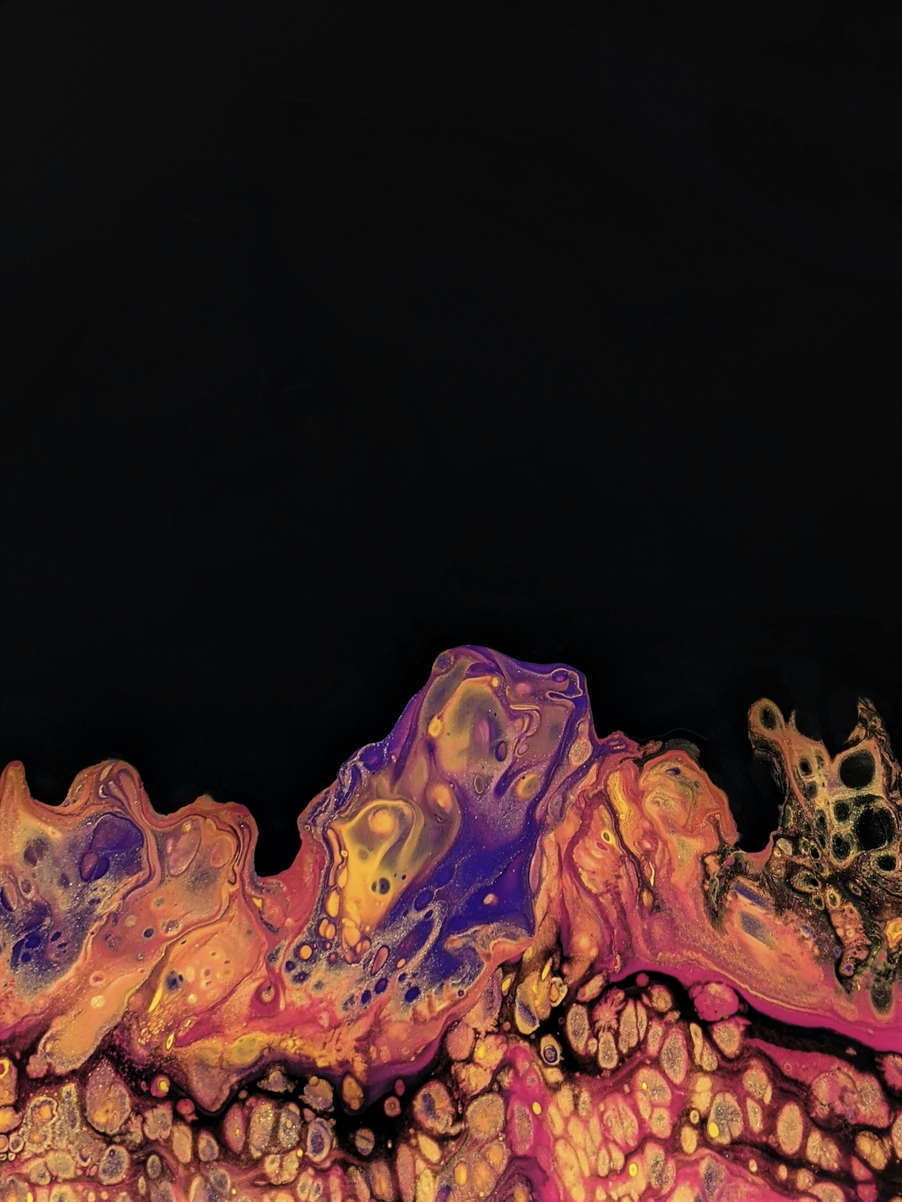 a close up of a cell phone with a black background