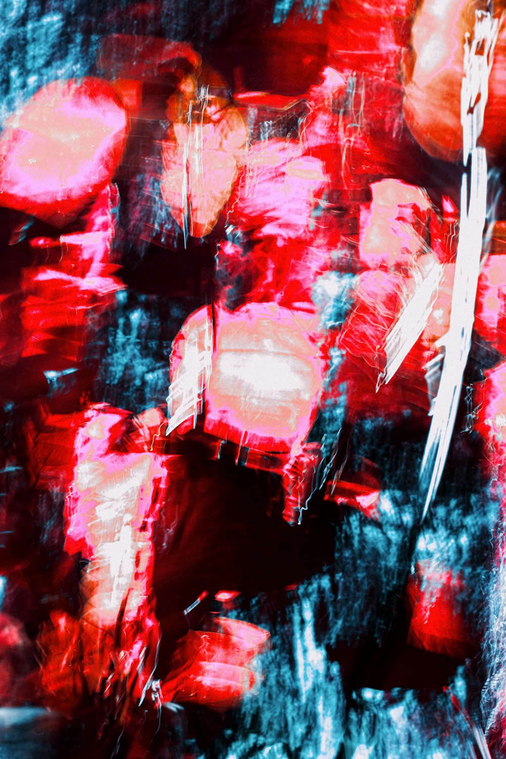 an abstract painting of red and black squares
