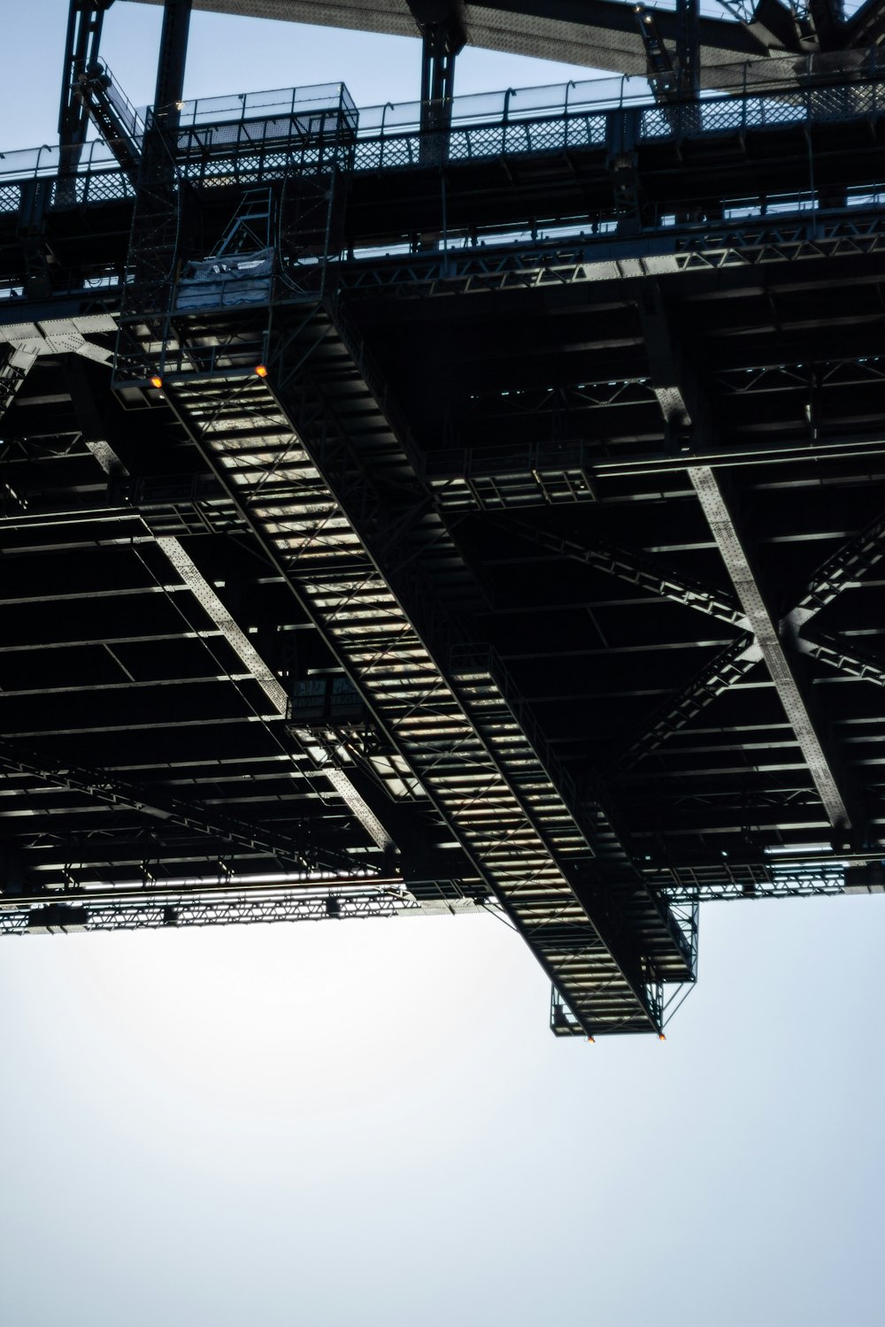 a view of the underside of a bridge from below