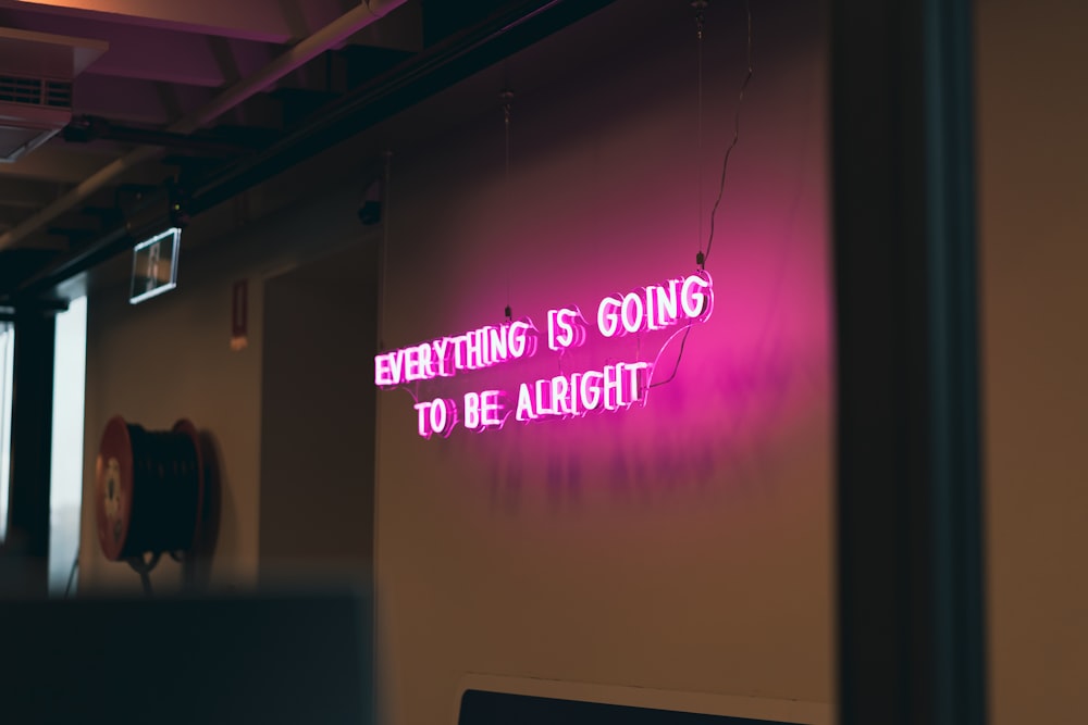 a neon sign that reads everything is going to be alright
