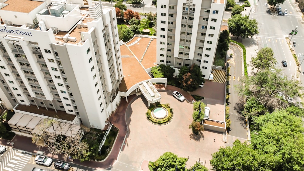 an aerial view of a large white building