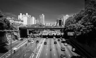 a black and white photo of a city street