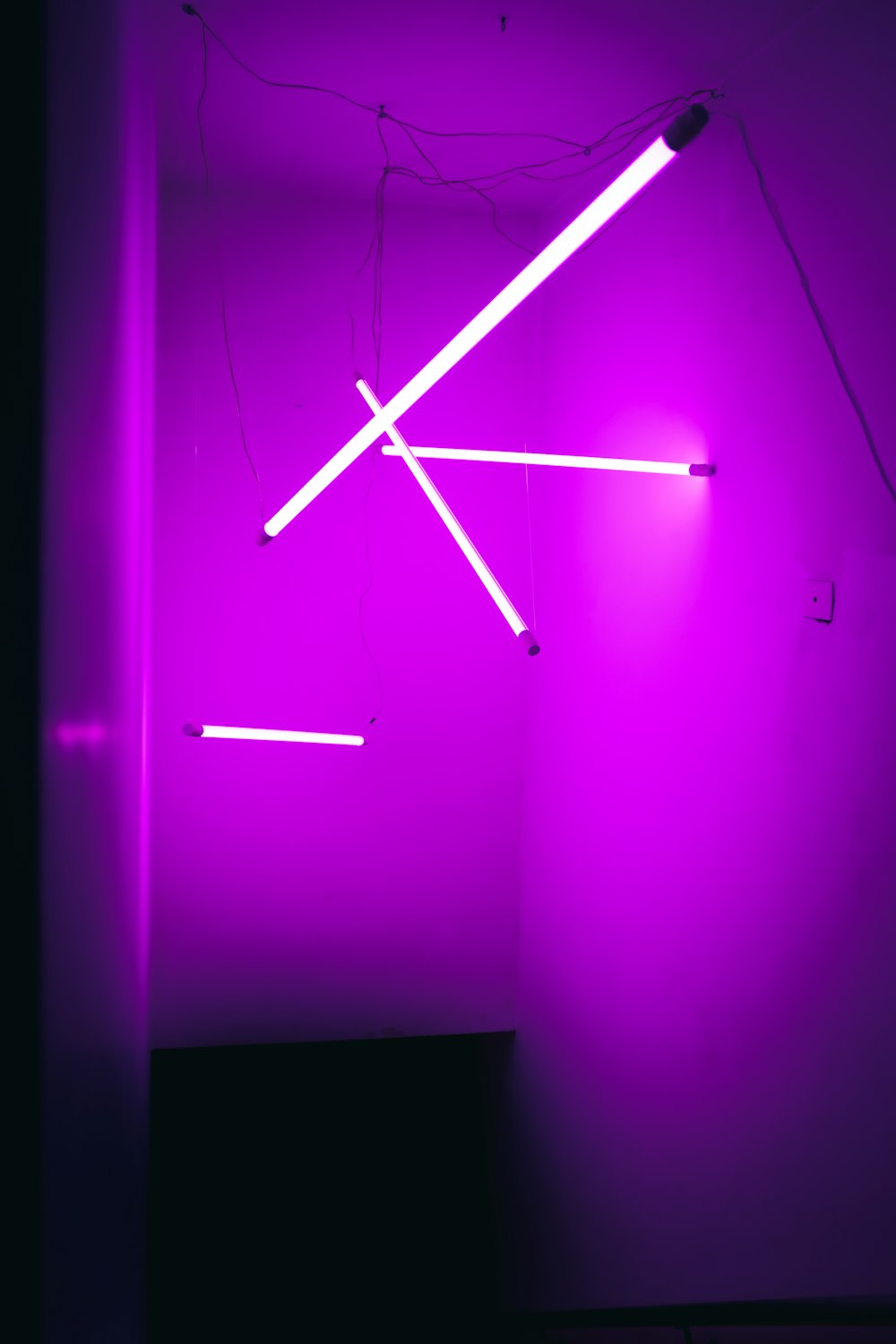 a room with a purple light in it