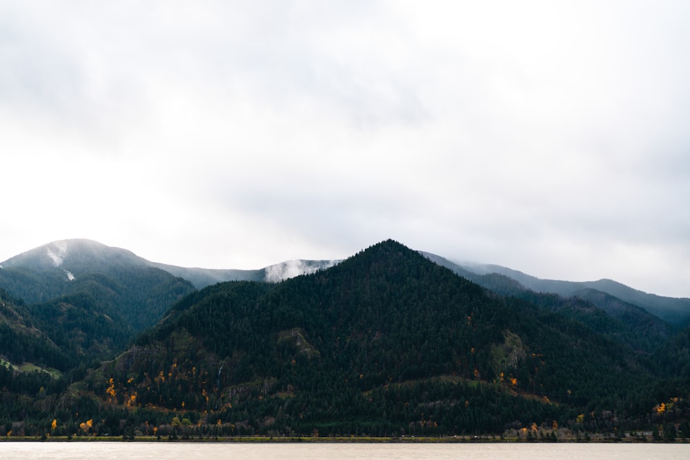 a large body of water surrounded by mountains