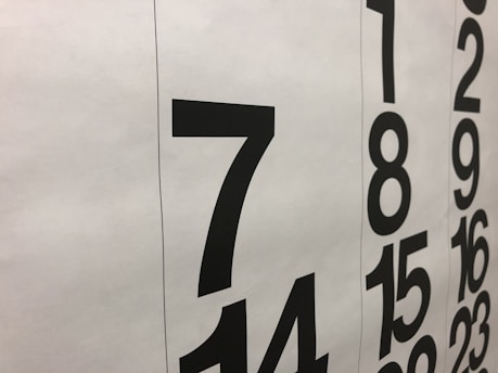 A calendar with many crossed-out days symbolizing long waiting times.