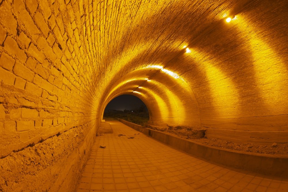 a long tunnel with a light at the end