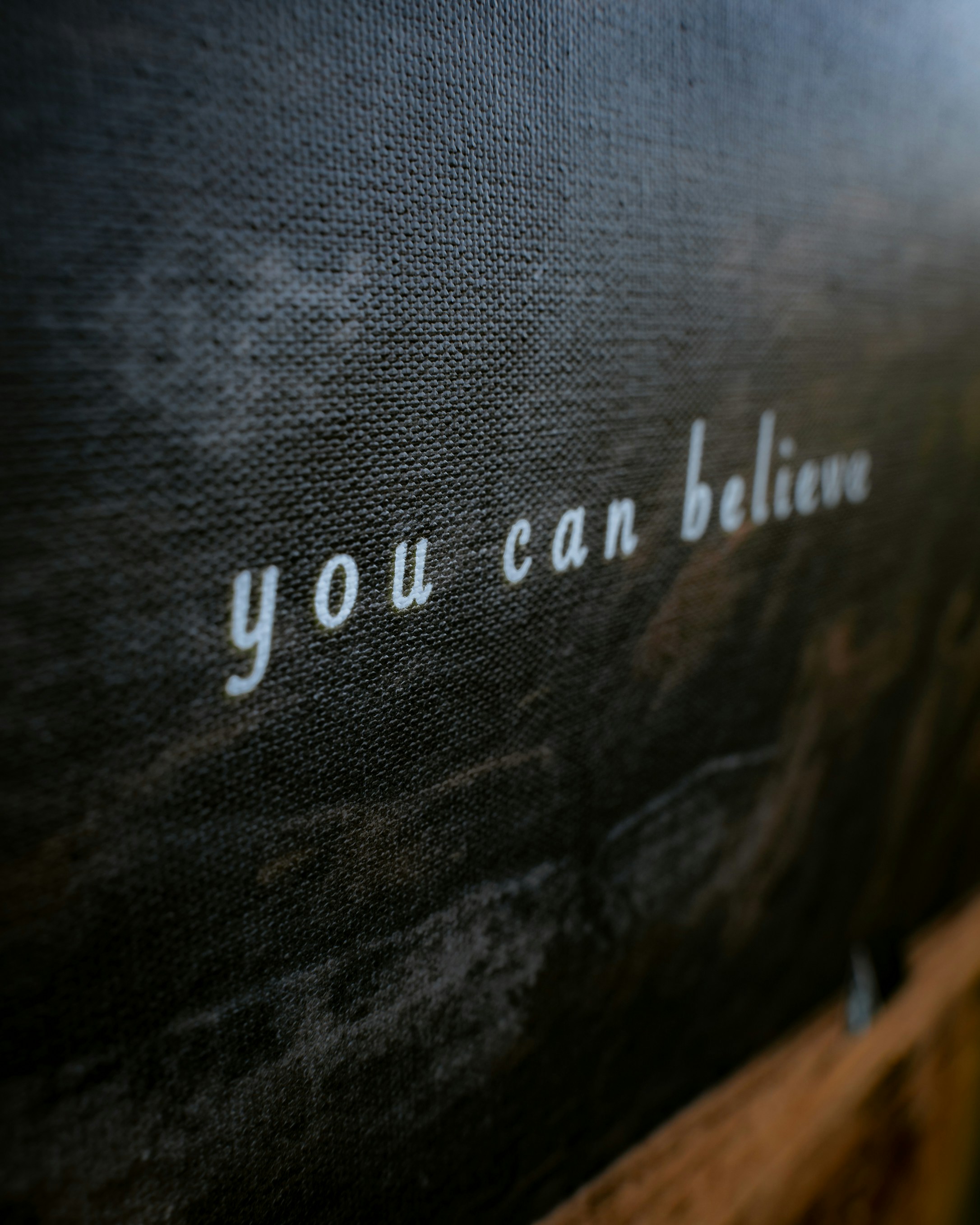 a close up of a wall with writing on it