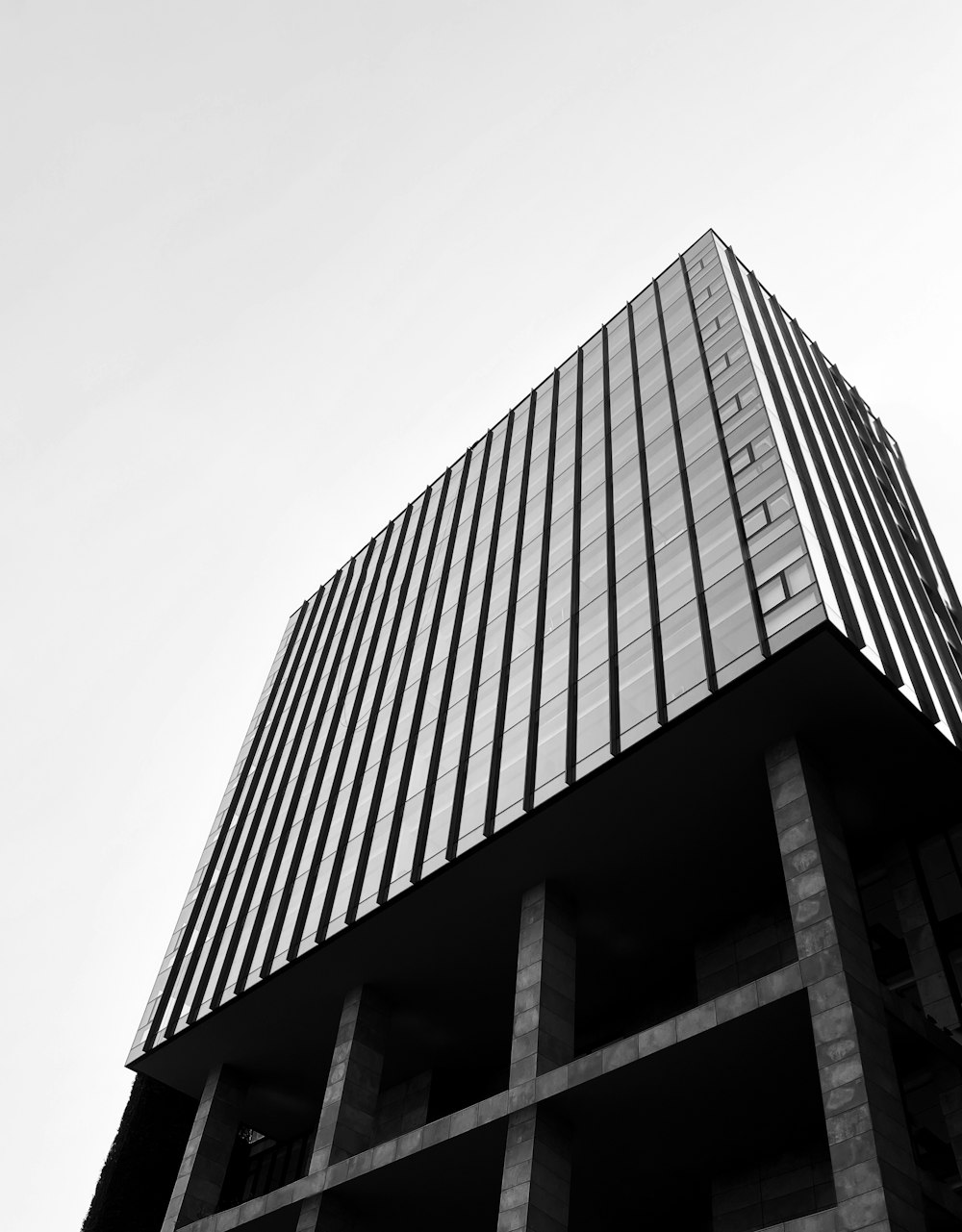 a black and white photo of a tall building