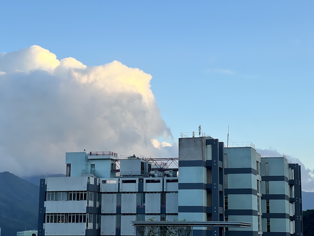 a building with a lot of windows and a sky background