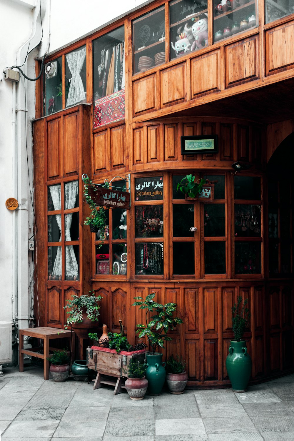 a bench in front of a store